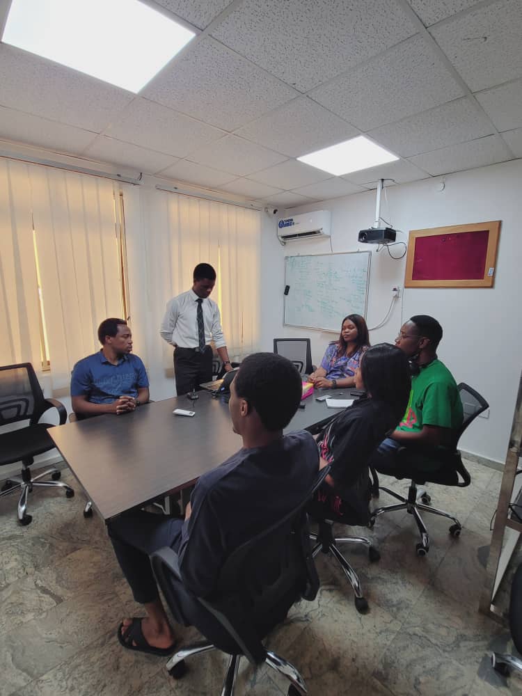 Students studying technology and innovation in modern international campus setting